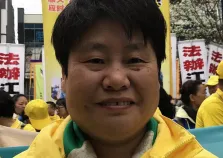 Нинг Ши, последователка на Фалун Дафа